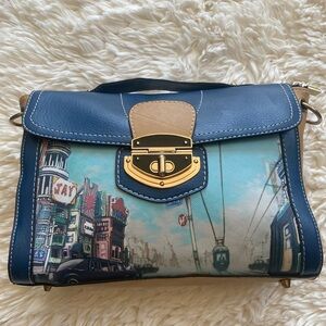 Faux leather purse with design